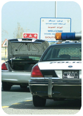 The car in the photograph has been stopped for driving too fast in a residential area.
